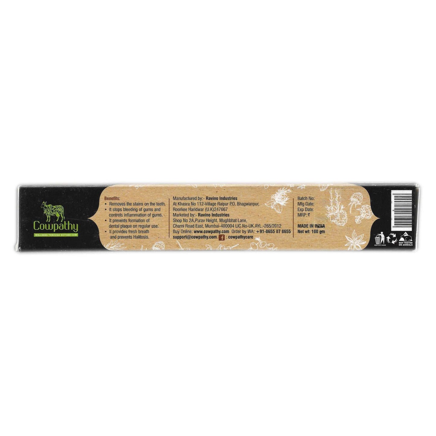 Cowpathy Panchgavya Fluoride Free Toothpaste box with green cow logo and benefit list; claims include stain removal, gum and enamel inflammation relief, plaque mobility support, and bad breath prevention; includes manufacturer details, contact info, and website.