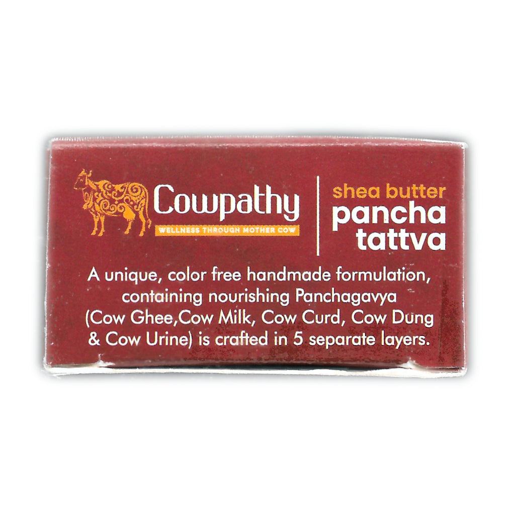 Cowpathy Pancha Tattva Soap packaging with cow graphic; five-layer handmade soap with shea butter and Panchagavya for skin wellness.