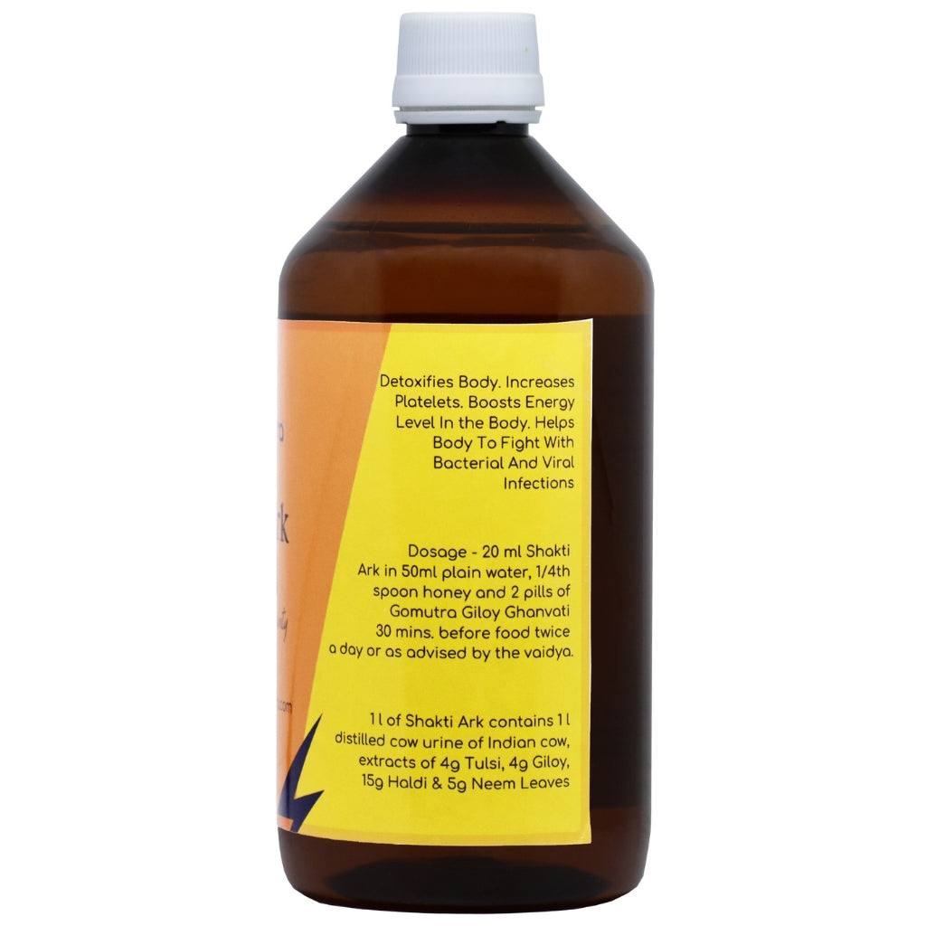 500ml bottle of Gaurashtra Shakti Gomutra Ark with Haldi, Neem, Tulsi on white background