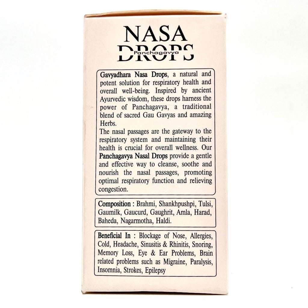 Back panel of the Gavya Dhara “NASA Drops Panchagavya” outer packaging displaying detailed product description, ingredients, and Ayurvedic benefits. Highlights include nasal support for sinusitis, migraine, insomnia, and brain-related disorders, with a herbal blend featuring Brahmi, Shankhpushpi, Tulsi, Gaucurd, Gaumilk, Amla, Harad, Baheda, Nagarmotha, and Haldi. Text emphasizes holistic wellness inspired by ancient Ayurvedic wisdom.