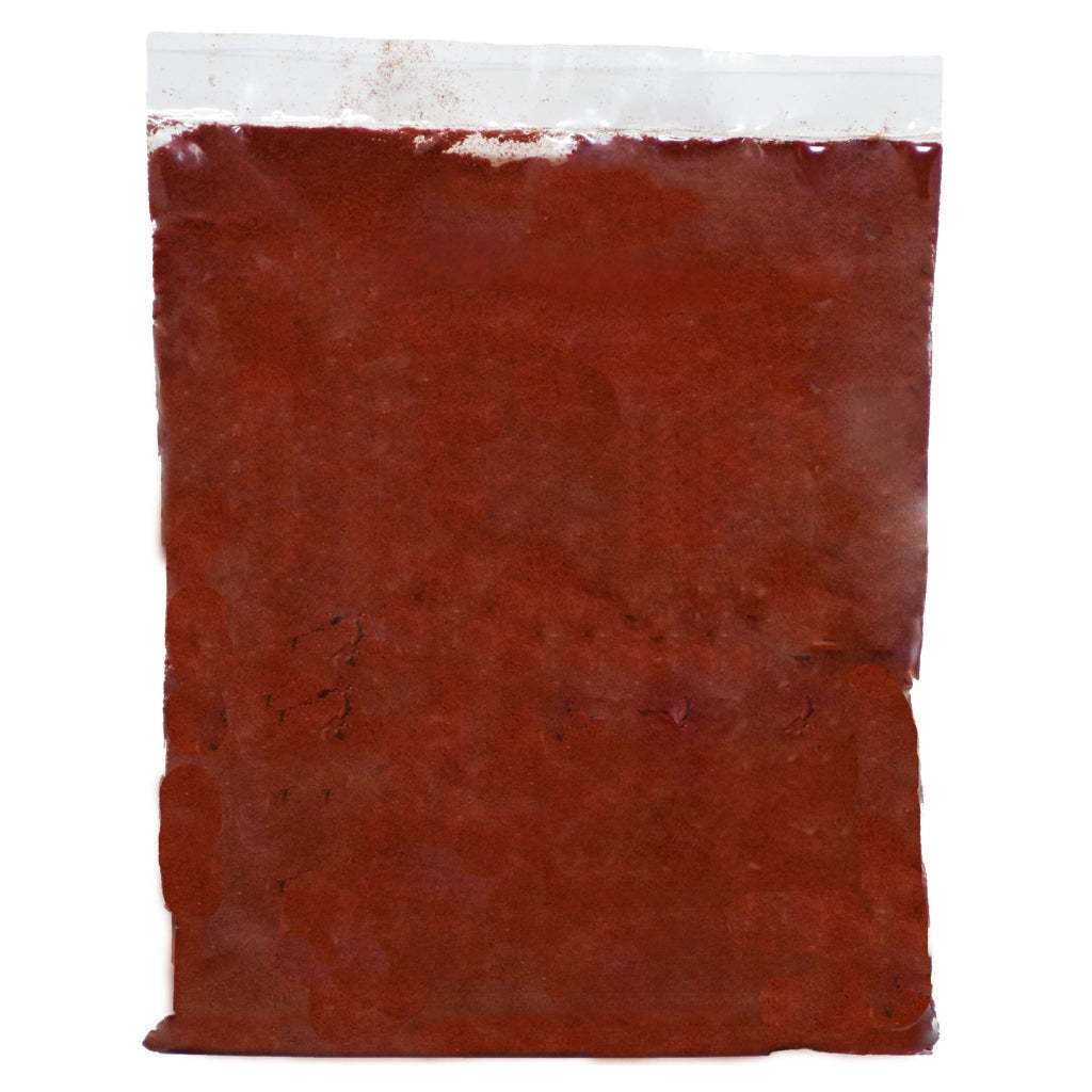 Gou Ganga Kumkum Powder pack placed beside turmeric roots, cow ghee container, and rose petals—showcasing its Ayurvedic purity and traditional use as natural sindoor.