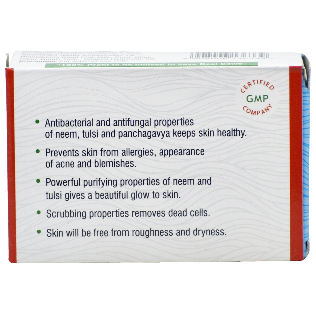 Back of Gou Ganga Neem Tulsi Ayurvedic Handmade Soap packaging highlighting skin benefits—antibacterial, anti-acne, exfoliating, with Panchagavya and herbal ingredients