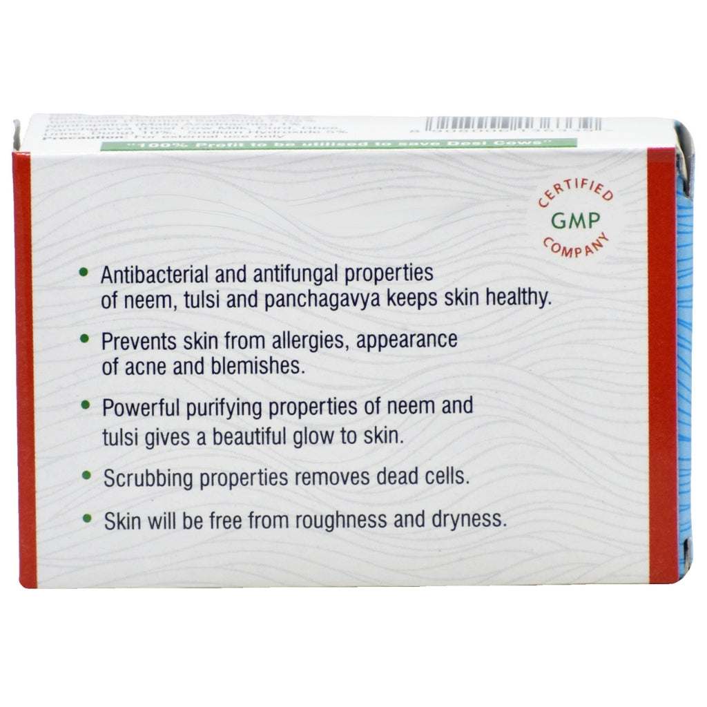 Back of Gou Ganga Neem Tulsi Ayurvedic Handmade Soap packaging highlighting skin benefits—antibacterial, anti-acne, exfoliating, with Panchagavya and herbal ingredients