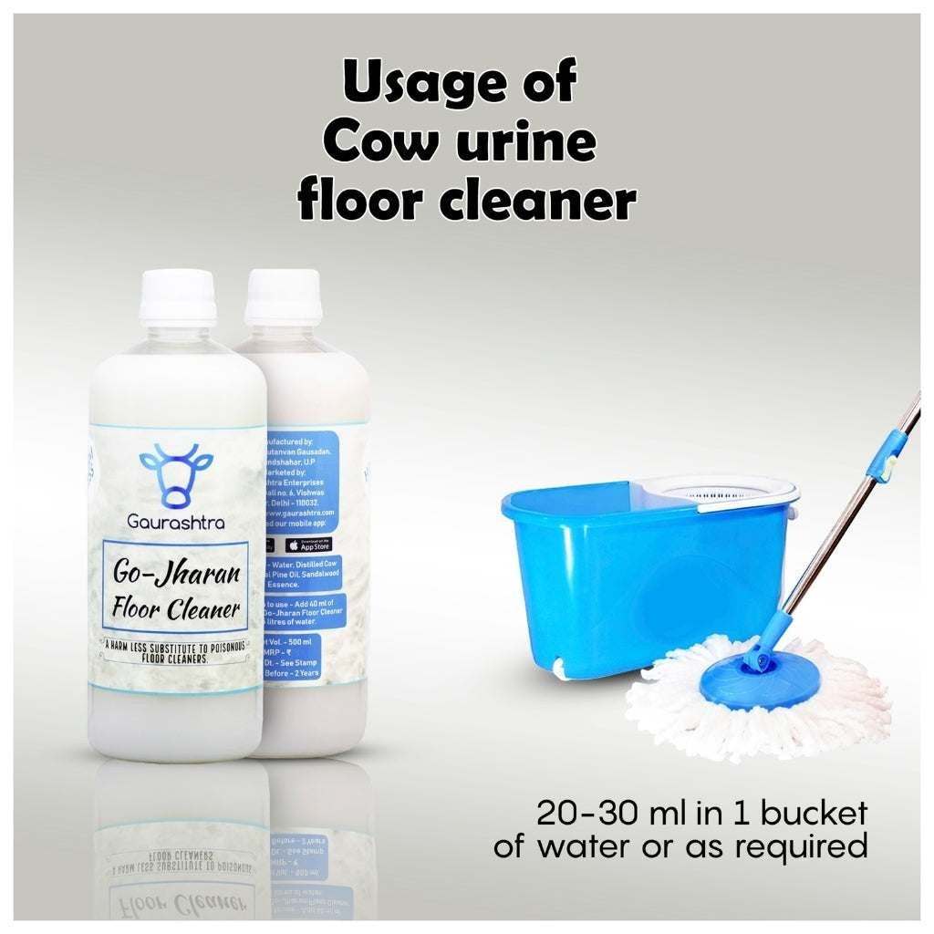 Gaurashtra Go-Jharan Cow Urine Floor Cleaner 500ml bottle next to a blue spin mop bucket.