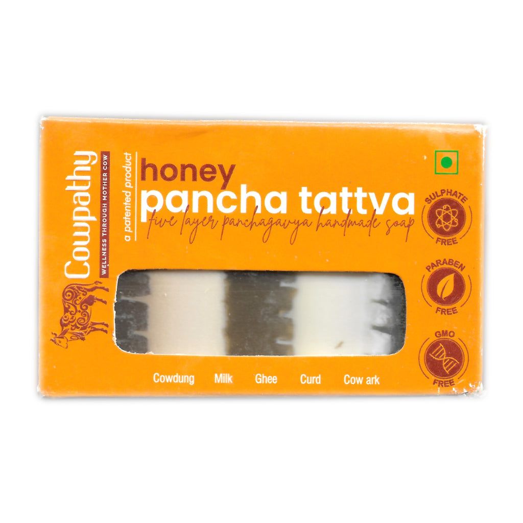 Cowpathy Honey Pancha Tattva Soap – patented Ayurvedic bath bar with cow-based ingredients, eco-friendly packaging, and visible soap layers.