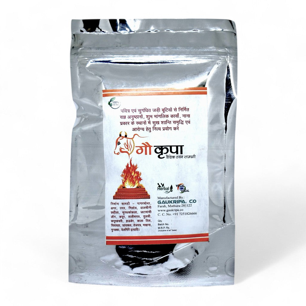 Gau Kripa Havan Samagri packet surrounded by dried herbs, wood chips, and sacred leaves—reflecting its Ayurvedic blend and ritualistic purity.