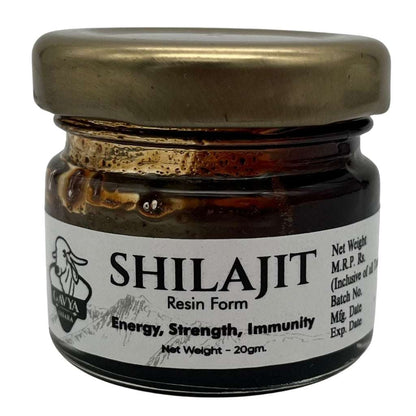 Small jar of Gavya Dhara Shilajit Resin Form with metallic lid, labeled “SHILAJIT Resin Form – Energy, Strength, Immunity.” Contains 20 grams. Front label also includes M.R.P., manufacturing and expiry dates, and batch number details. Goat icon and Gavya Dhara branding featured prominently, emphasizing Ayurvedic vitality.