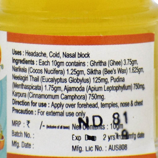 Side panel of Nivedana Headache Balm jar detailing Ayurvedic uses and ingredient composition. Indications include headache, cold, and nasal blockage. Key ingredients listed per 10g include Cow Ghee, Narikela (Coconut), Beeswax, Eucalyptus Oil, Pudina (Mint), Ajamoda (Carom), and Camphor. Directions for external application over forehead, temples, chest, and nose. Label includes manufacturing info, batch details, and expiry date.