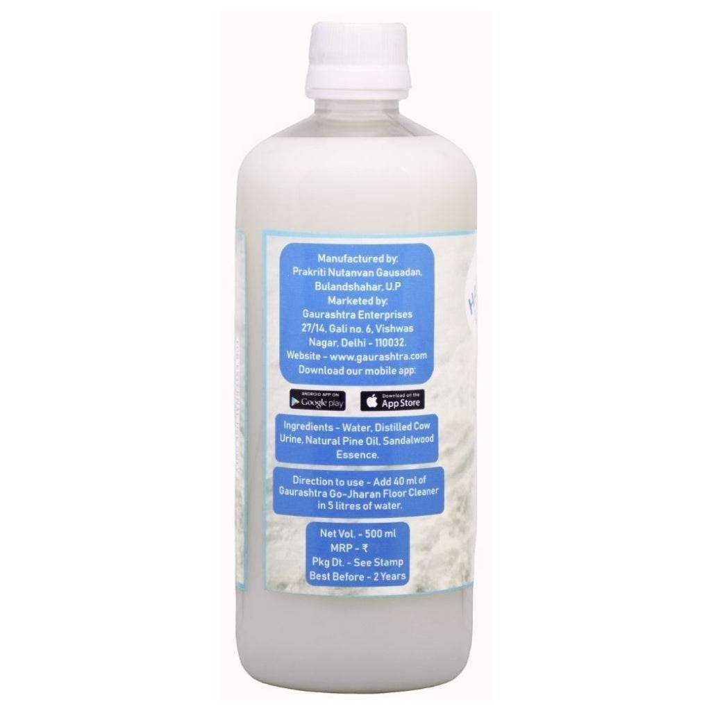 Gaurashtra Cow Urine Floor Cleaner 500ml bottle with label detailing ingredients like distilled cow urine, neem, sandalwood, pine oil. Natural cleaner.